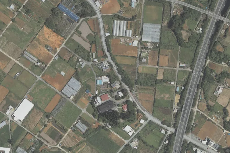 神村酒造 泡盛工場見学（うるま・石川）のあたりの空中写真（国土地理院）